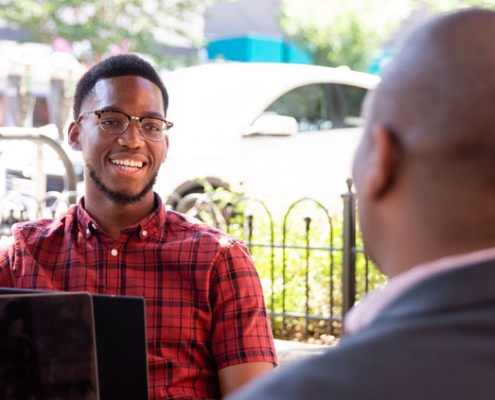 Image of Mentor and Mentee Talking